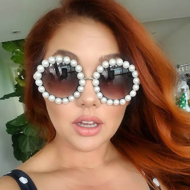 Dame designer-solbrille med perlebesatt ramme Luvikno