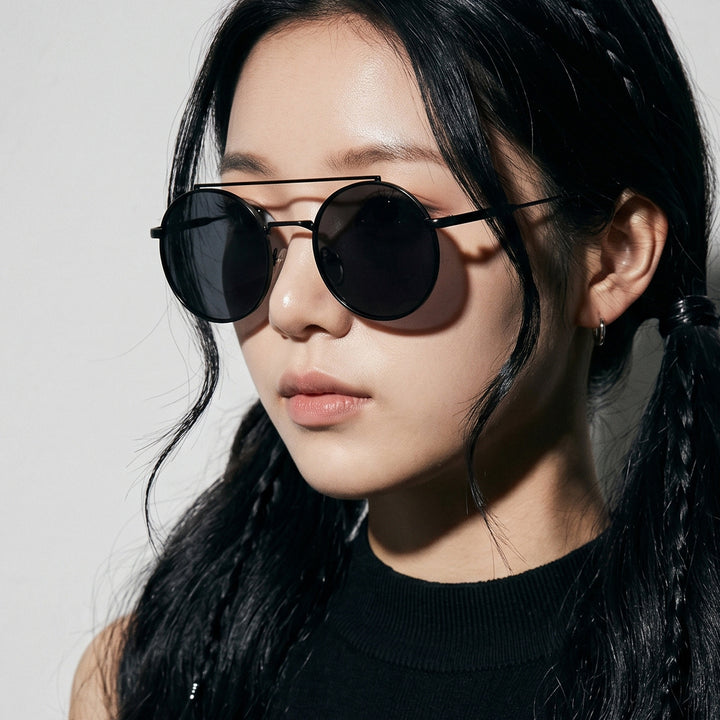 Dame rund solbrille med moteramme Luvikno