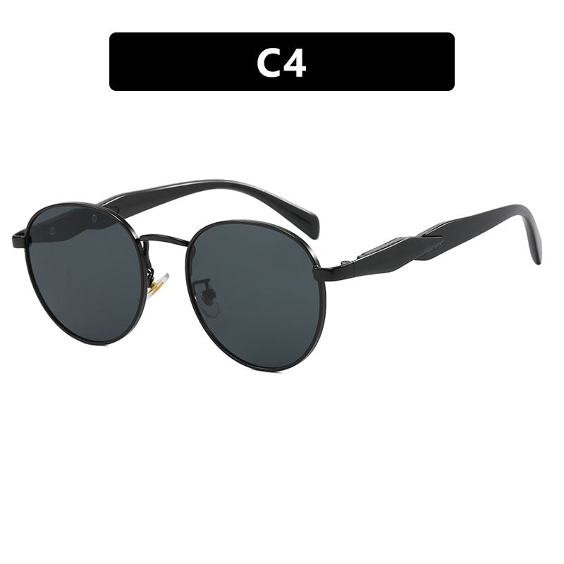 Dame rund solbrille med elegant, gyllen ramme og UV-beskyttelse Luvikno