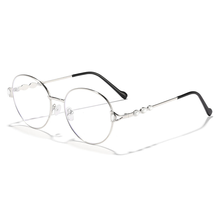 Dame rund solbrille med elegant metallramme og speilvendte glass Luvikno