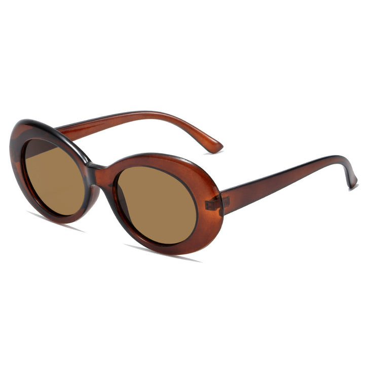 Dame retro-inspirerte solbriller med en elegant, oval ramme Luvikno