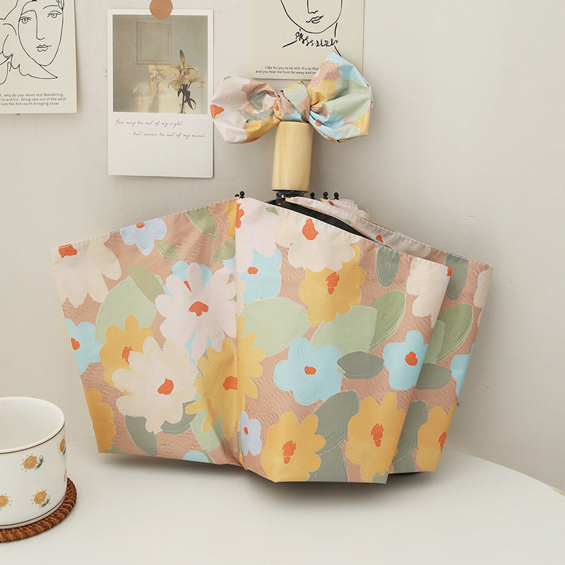 Dame sammenleggbar paraply med kreativt blomsterdesign og automatisk åpningsmekanisme Luvikno