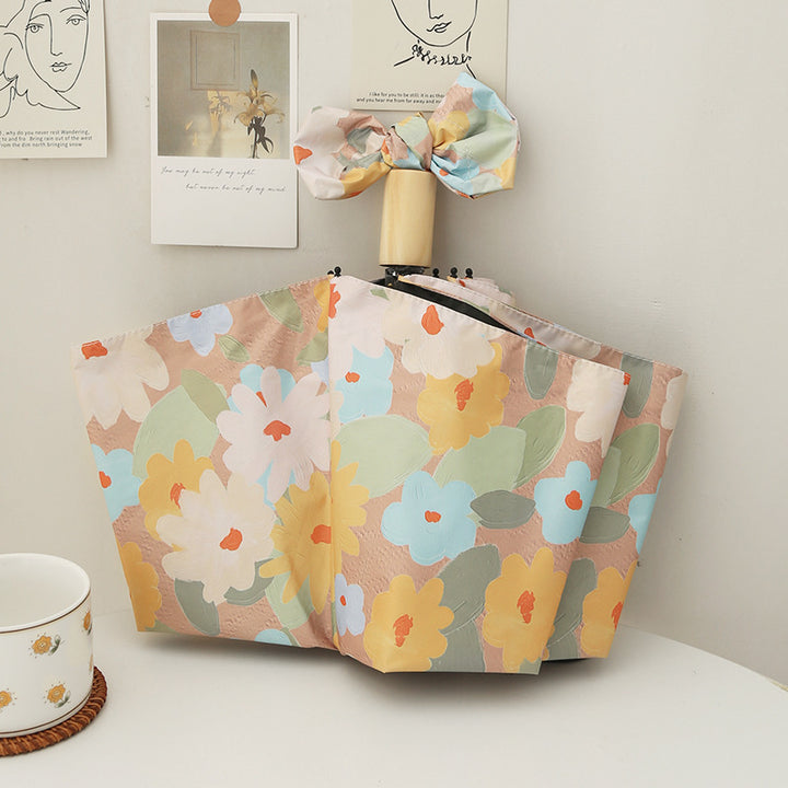 Dame sammenleggbar paraply med kreativt blomsterdesign og automatisk åpningsmekanisme Luvikno