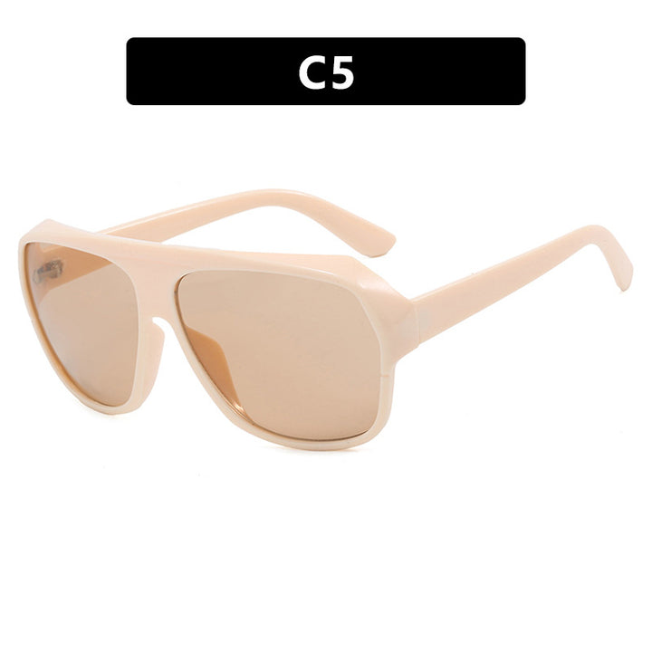 Dame moteriktig oversized solbrille med sporty design Luvikno