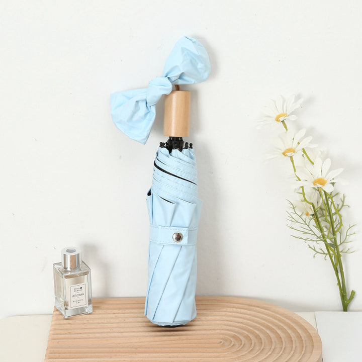 Dame kompakt sammenleggbart regnparaply med elegant design og ergonomisk tremanor Luvikno
