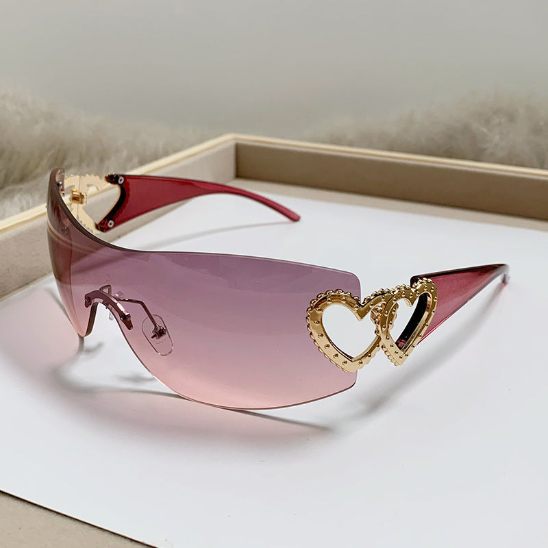 Dame designer-solbrille med luksuriøs hjerte-akseent Luvikno