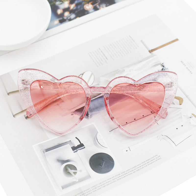 Dame hjerteformet solbrille med glitrende ramme Luvikno