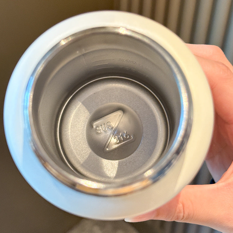 Dame isolert drikkeflaske med dyrevennlig design Luvikno