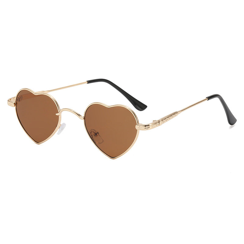 Damer hjerteformet solbrille med filigran metallramme Luvikno