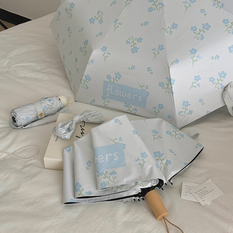 Damer Faltende Paraply med stilfullt blomsterdesign Luvikno