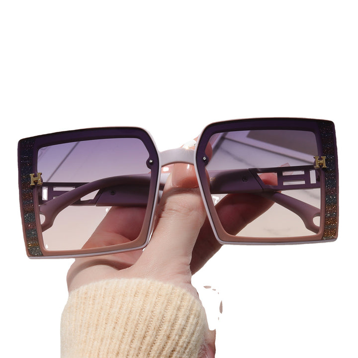 Dame trendy solbrille med ekstravagant, rektangulær ramme Luvikno