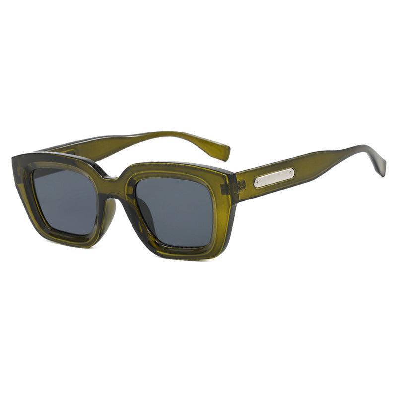 Dame kvadratisk solbrille med gjennomsiktig ramme og brune glass Luvikno
