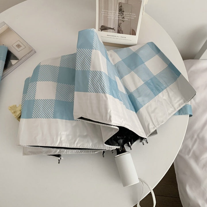 Dame sammenleggbart paraply med spesiell design Luvikno