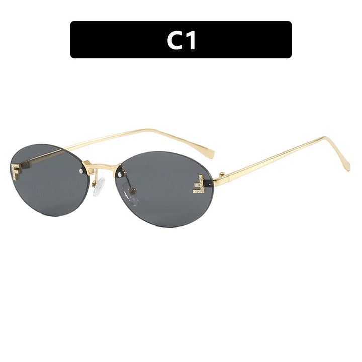 Dame mote trendy solbriller med elegante, runde glass og filigran metallramme Luvikno