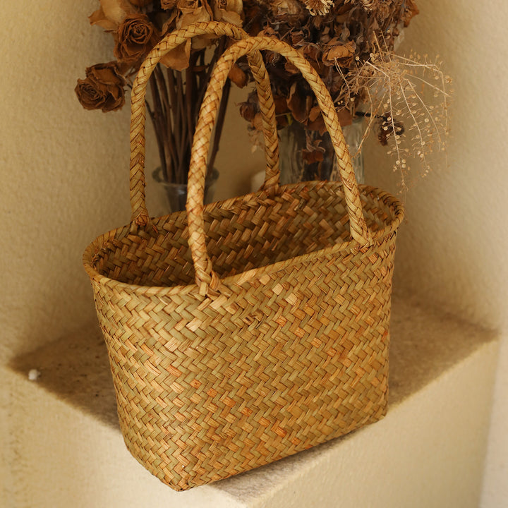 Unisex handlebag laget av flettet naturmateriale Luvikno