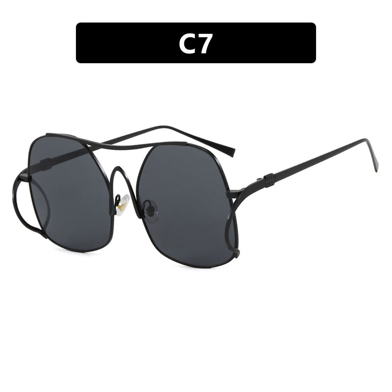 Dame geometrisk solbrille med smal metallramme og brune glass Luvikno