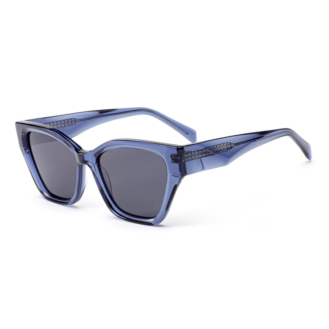 Dame solbrille med moderne ramme og lekne detaljer Luvikno