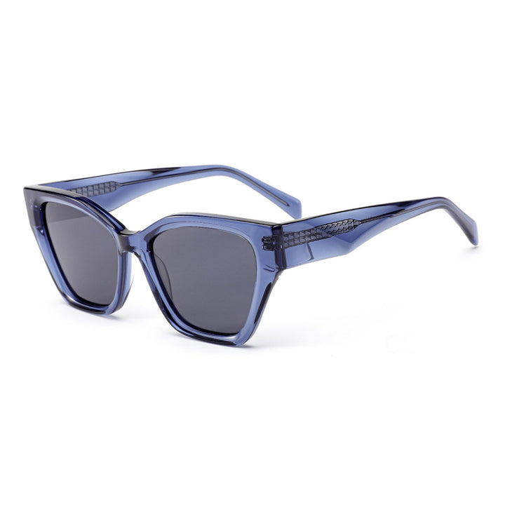 Dame solbrille med moderne ramme og lekne detaljer Luvikno