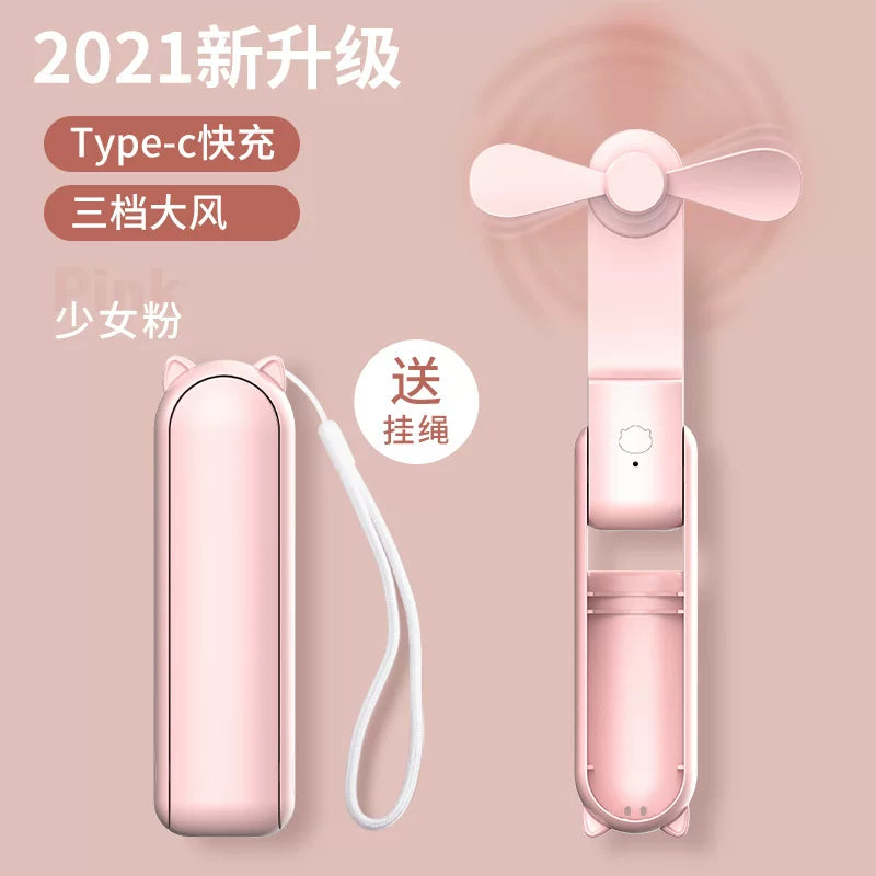 Unisex en størrelse sammenleggbar oppladbar trippel håndholdt mini vifte med innebygd powerbank USB-C og USB-A tilkoblinger samt håndleddsstropp Luvikno