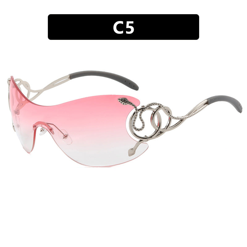 Dame futuristisk solbrille med lekent design Luvikno