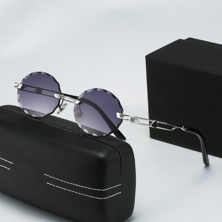 Dame rund solbrille med unikt bølgedesign og høykvalitets metallramme Luvikno