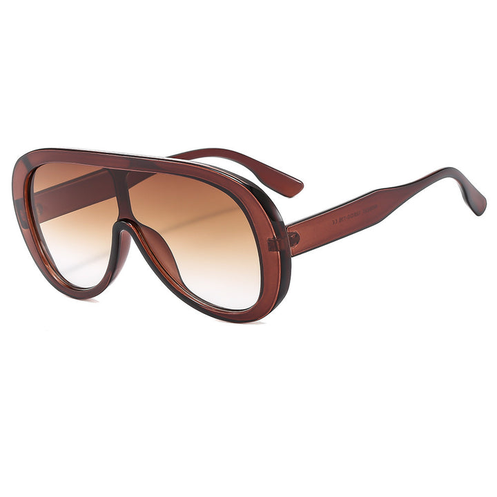 Dame moteriktig solbrille med bred ramme Luvikno