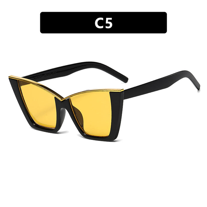 Dame ekstravagant solbrille med unik design og gullige aksenter Luvikno