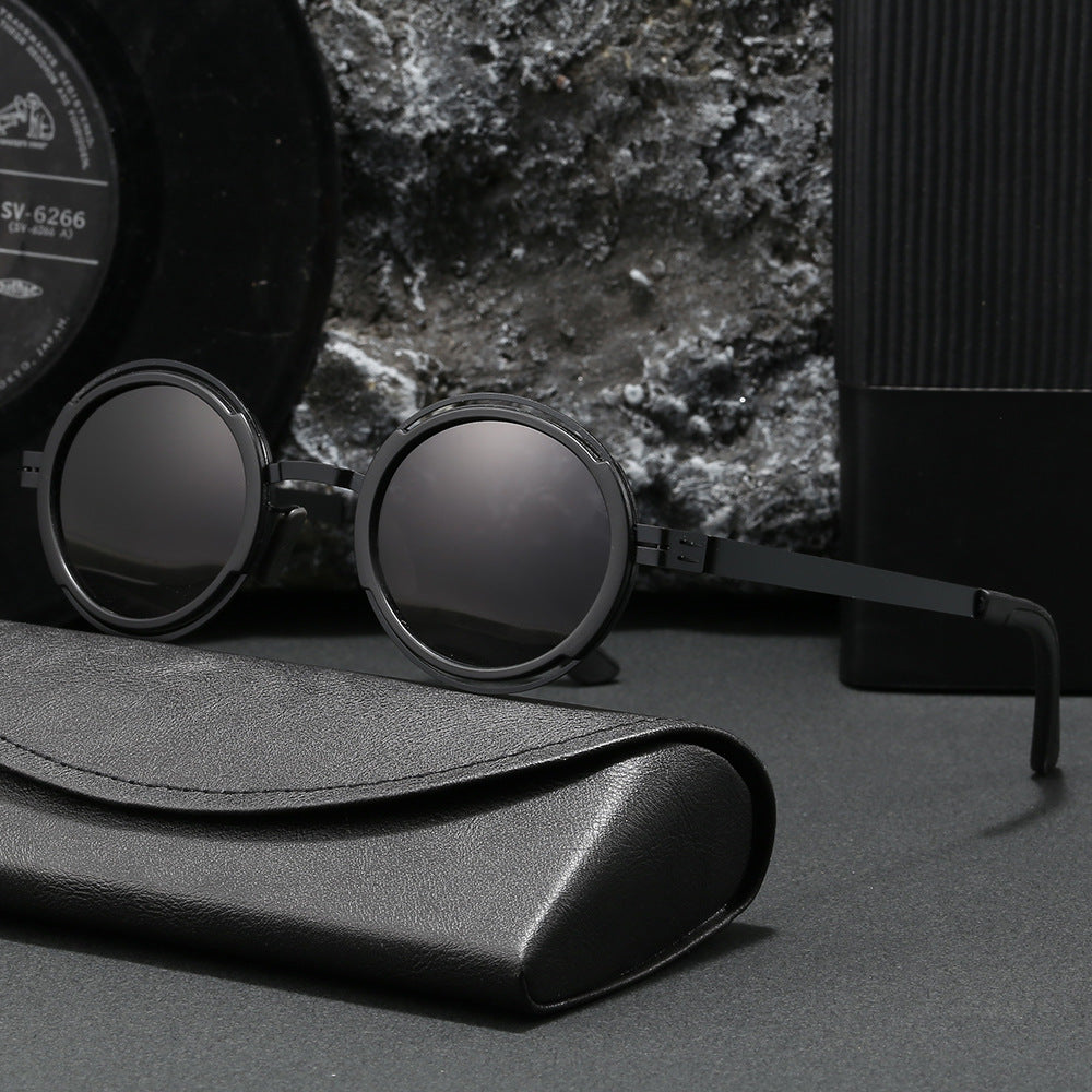 Damer moteriktig rund solbrille med elegant metallramme Luvikno