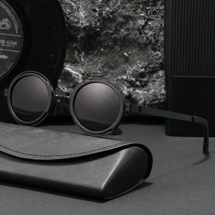 Damer moteriktig rund solbrille med elegant metallramme Luvikno