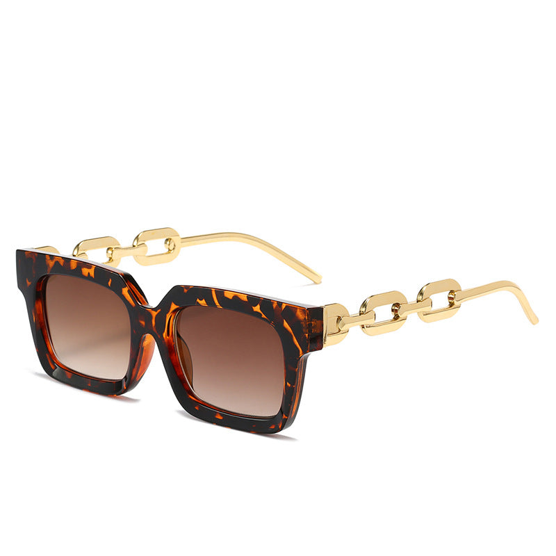 Dame moteriss solbrille med unikt kjedeelement Luvikno