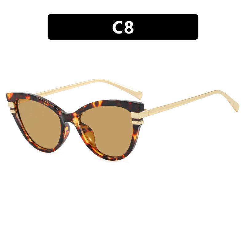Dame Cat-Eye solbriller med elegant plastramme og gullaccentuer Luvikno