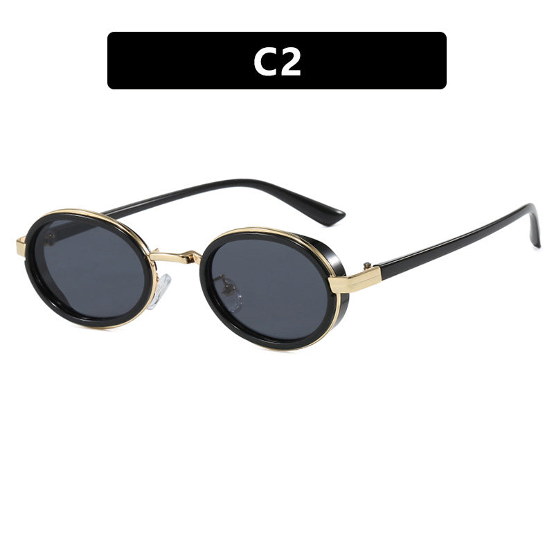 Dame rund solbrille med lette glass og gyldne detaljer Luvikno