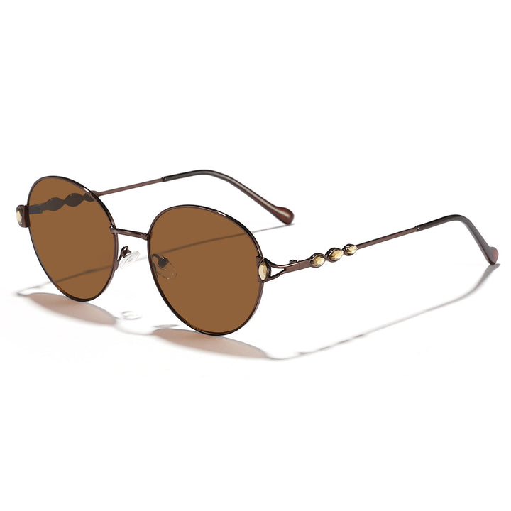 Dame rund solbrille med elegant metallramme og speilvendte glass Luvikno