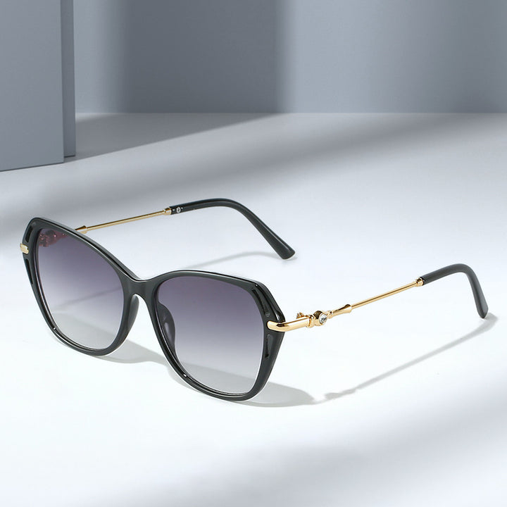 Dame moter Cat-Eye solbrille med elegant metallramme Luvikno