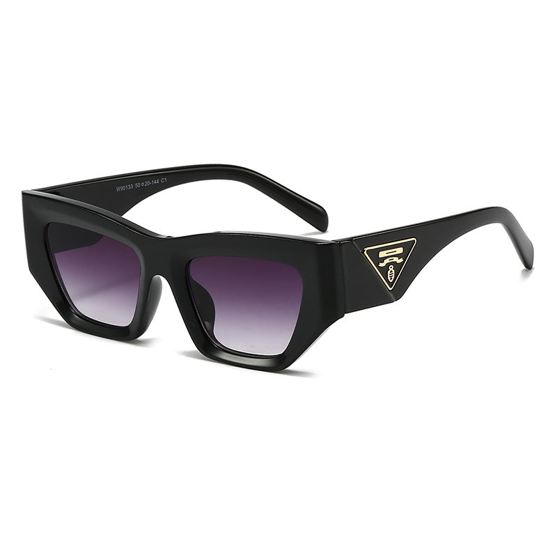 Dame Designer solbrille med moderne, geometrisk ramme Luvikno