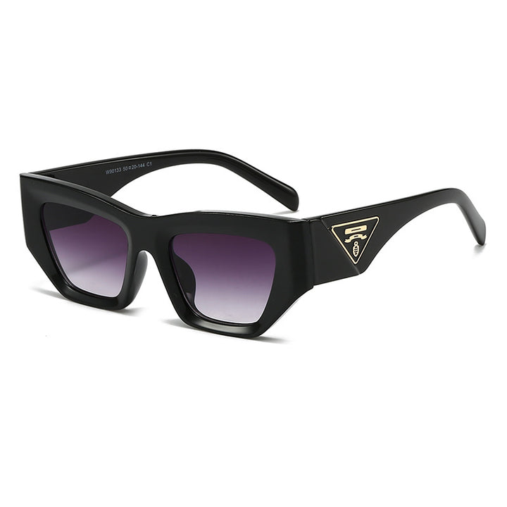 Dame Designer solbrille med moderne, geometrisk ramme Luvikno