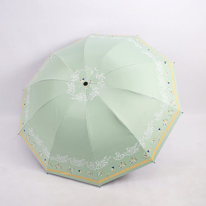 Kvinnens elegante sammenleggbare paraply med blomsterdesign Luvikno