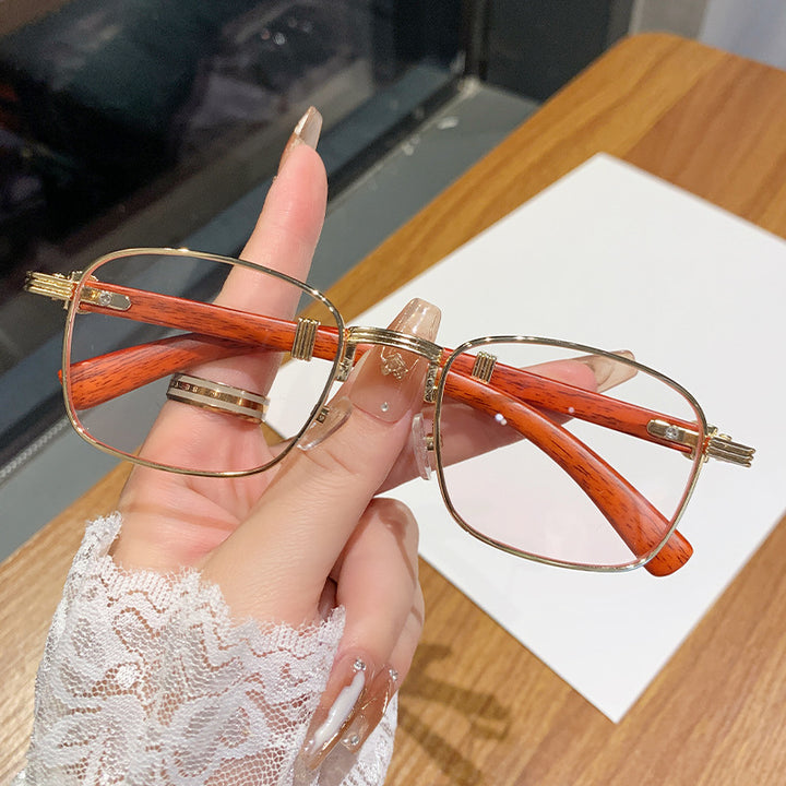 Dame solbrille med luksuriøs treinnfatning Luvikno