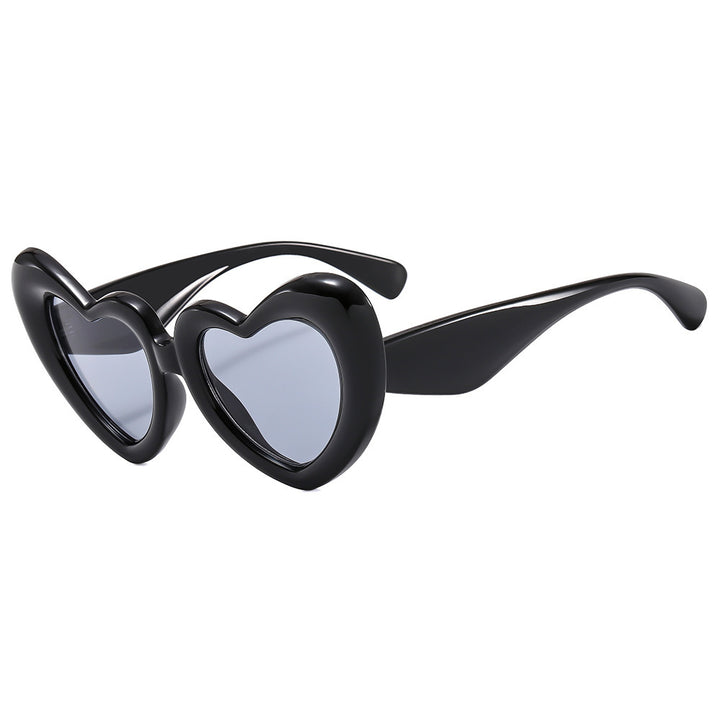 Dame Hjerteformet Solbrille med stilfull innramming Luvikno