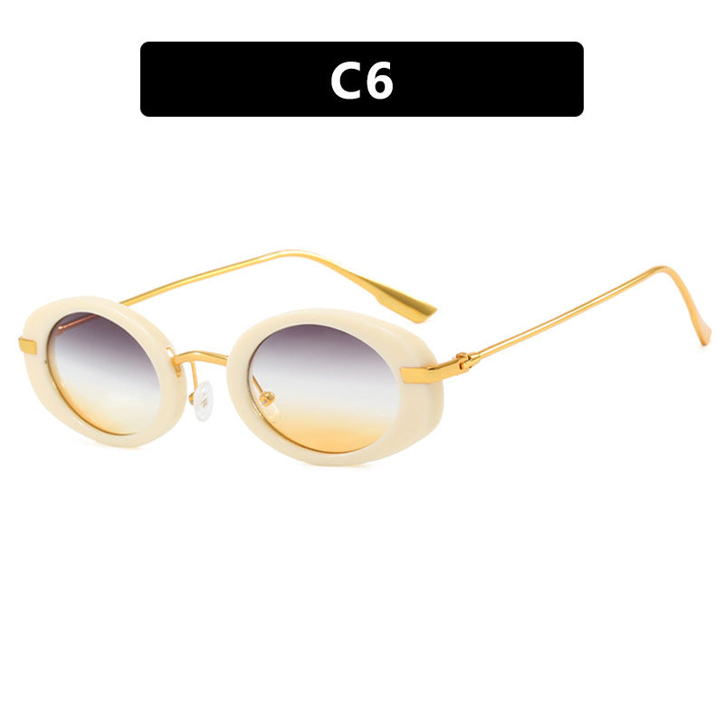 Dame moteriktig solbrille i elegant ovalt design Luvikno
