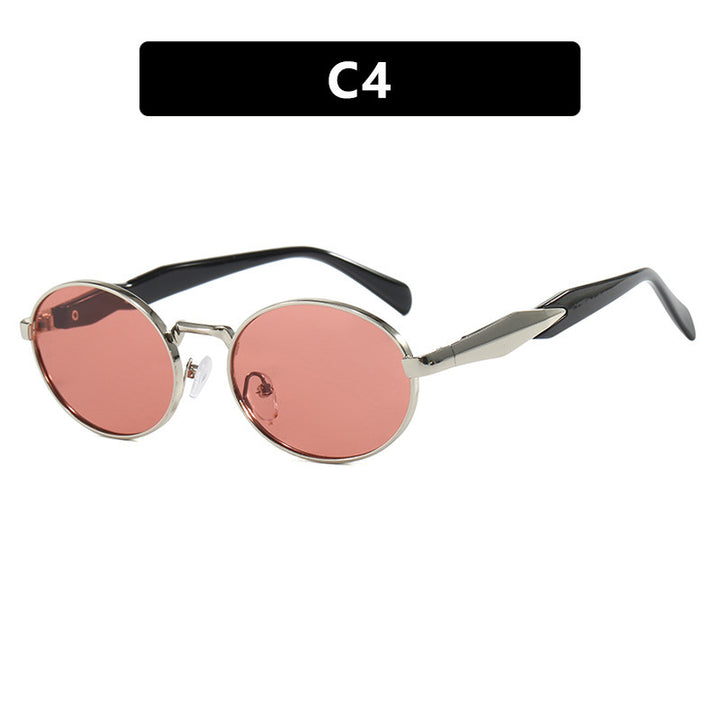 Dame moteriktig solbrille i elegant ovaldesign med trendy detaljer Luvikno