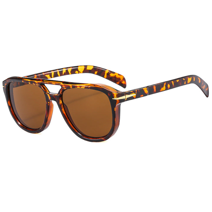 Dame solbrille med markant ramme og beskyttende linser Luvikno