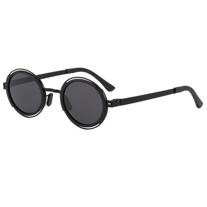 Damer moteriktig rund solbrille med elegant metallramme Luvikno