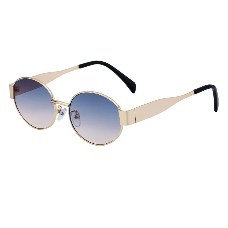 Dame moteriktig solbrille i elegant oval design Luvikno