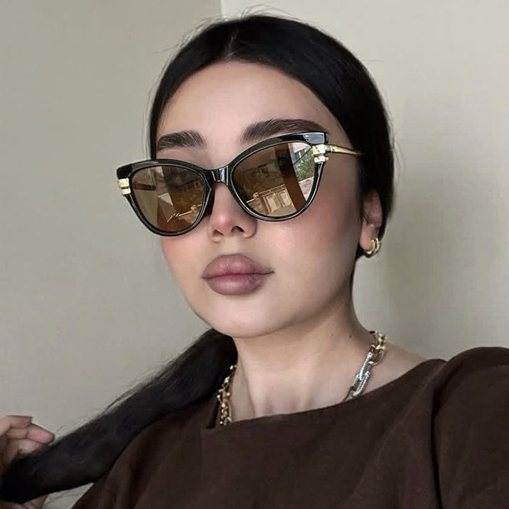 Dame Cat-Eye solbriller med elegant plastramme og gullaccentuer Luvikno