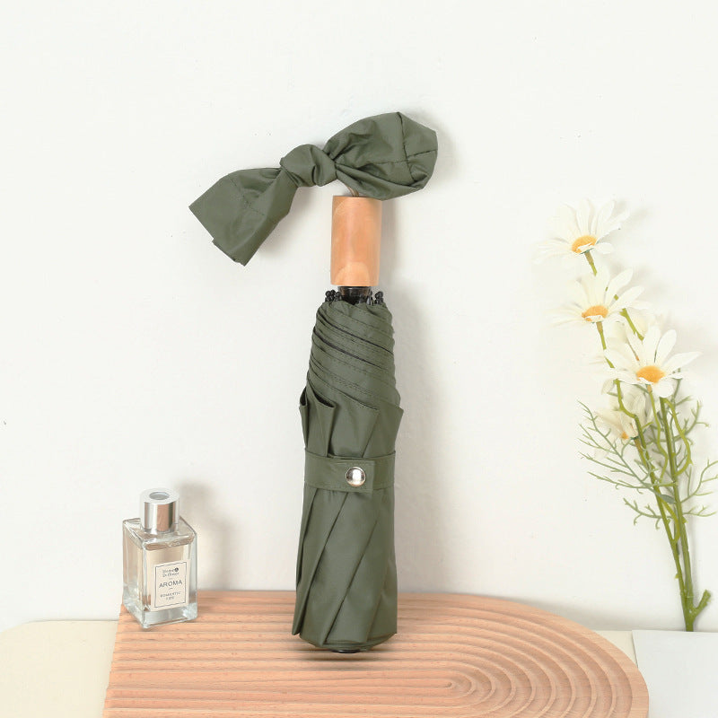 Dame kompakt sammenleggbart regnparaply med elegant design og ergonomisk tremanor Luvikno