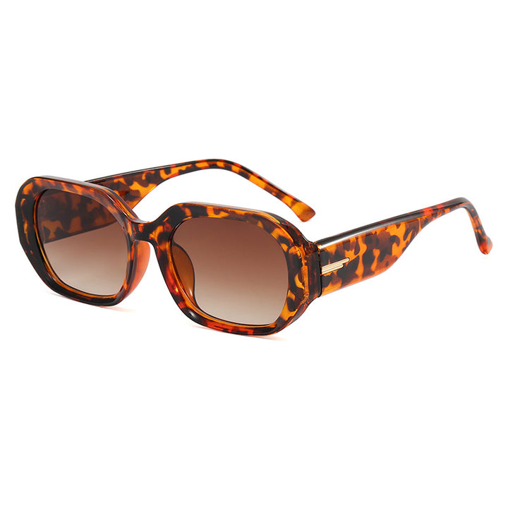 Dame moteriktig geometrisk solbrille med robust design Luvikno