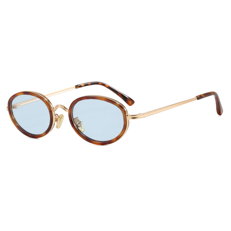 Dame elegant rund solbrille med moderne metallramme Luvikno
