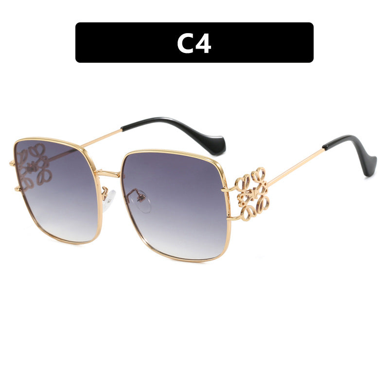 Dame kvadratisk solbrille med filigran design og luksuriøs metallramme Luvikno