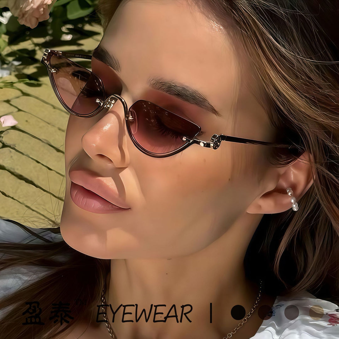 Dame cat-eye solbrille med filigran gullramme Luvikno